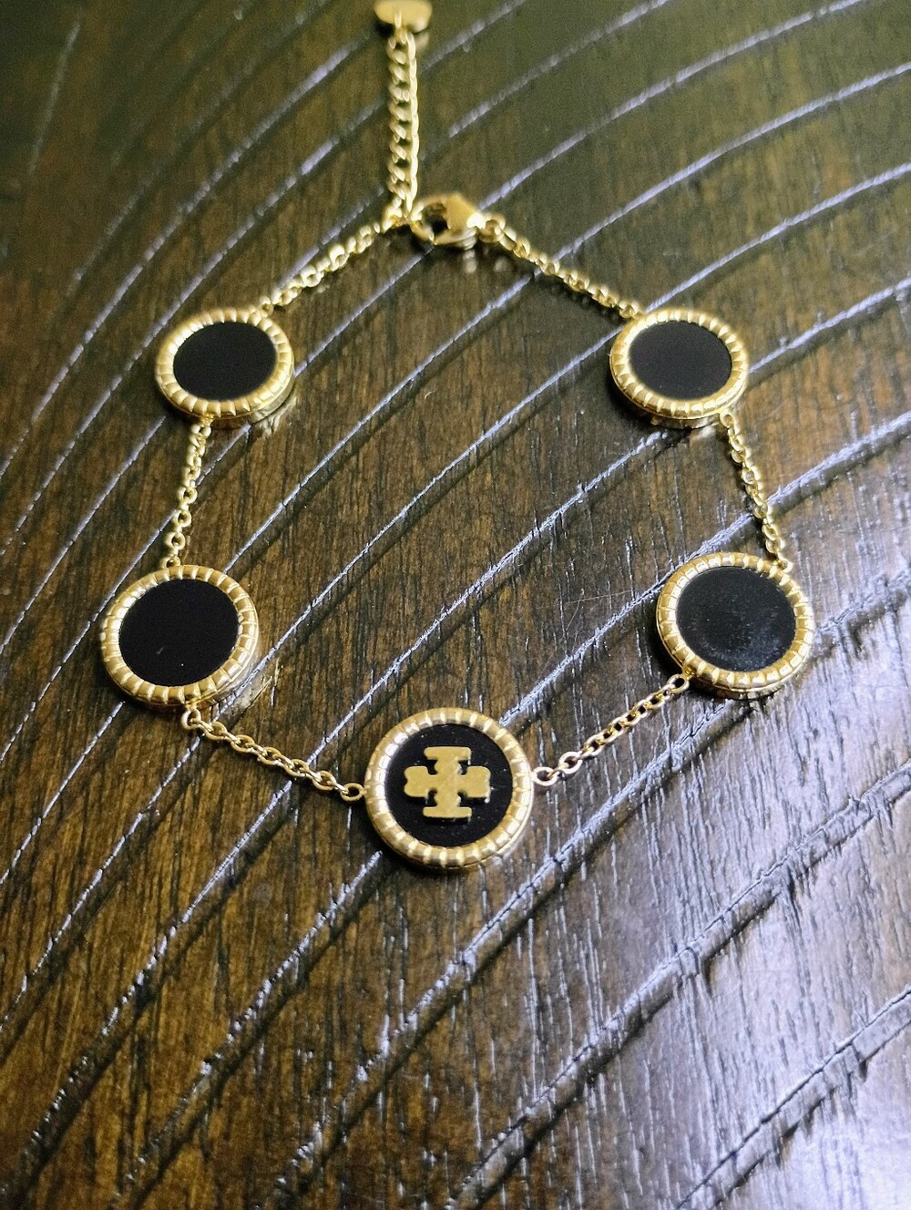 New  Black and Gold Logo Disc Bracelet